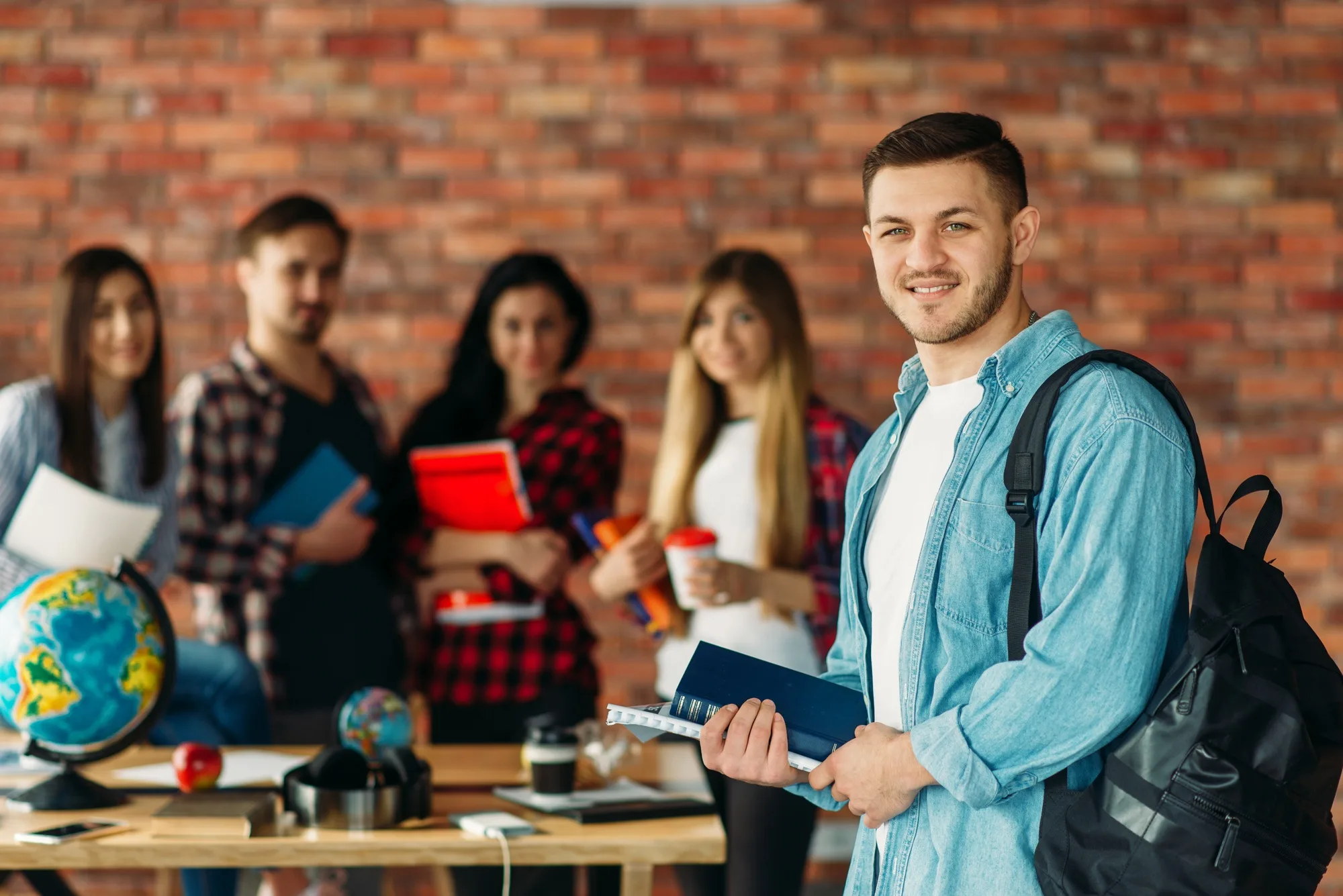 Group of highschool students with textbooks, team